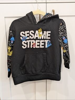 Sesame Street Black Hoodie with Colorful Character Accents